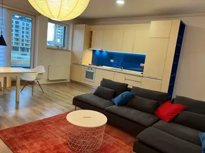 inchiriere apartament Sector 2, București living modern covor roșu